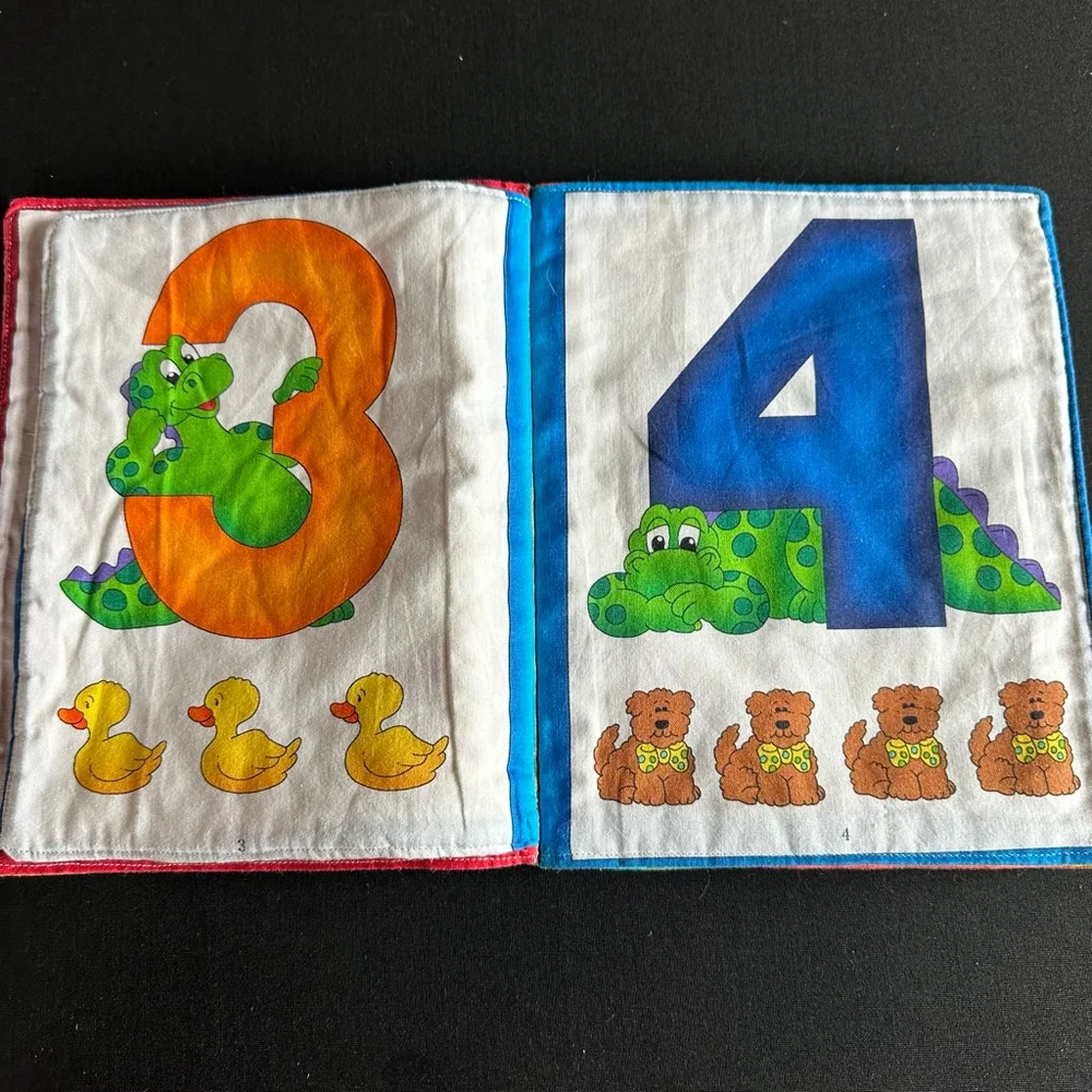 Dexter the Dinosaur Learning Toy Yellow Green cloth book